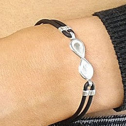 Solid Silver Infinity Bracelet with Faux Leather Strap