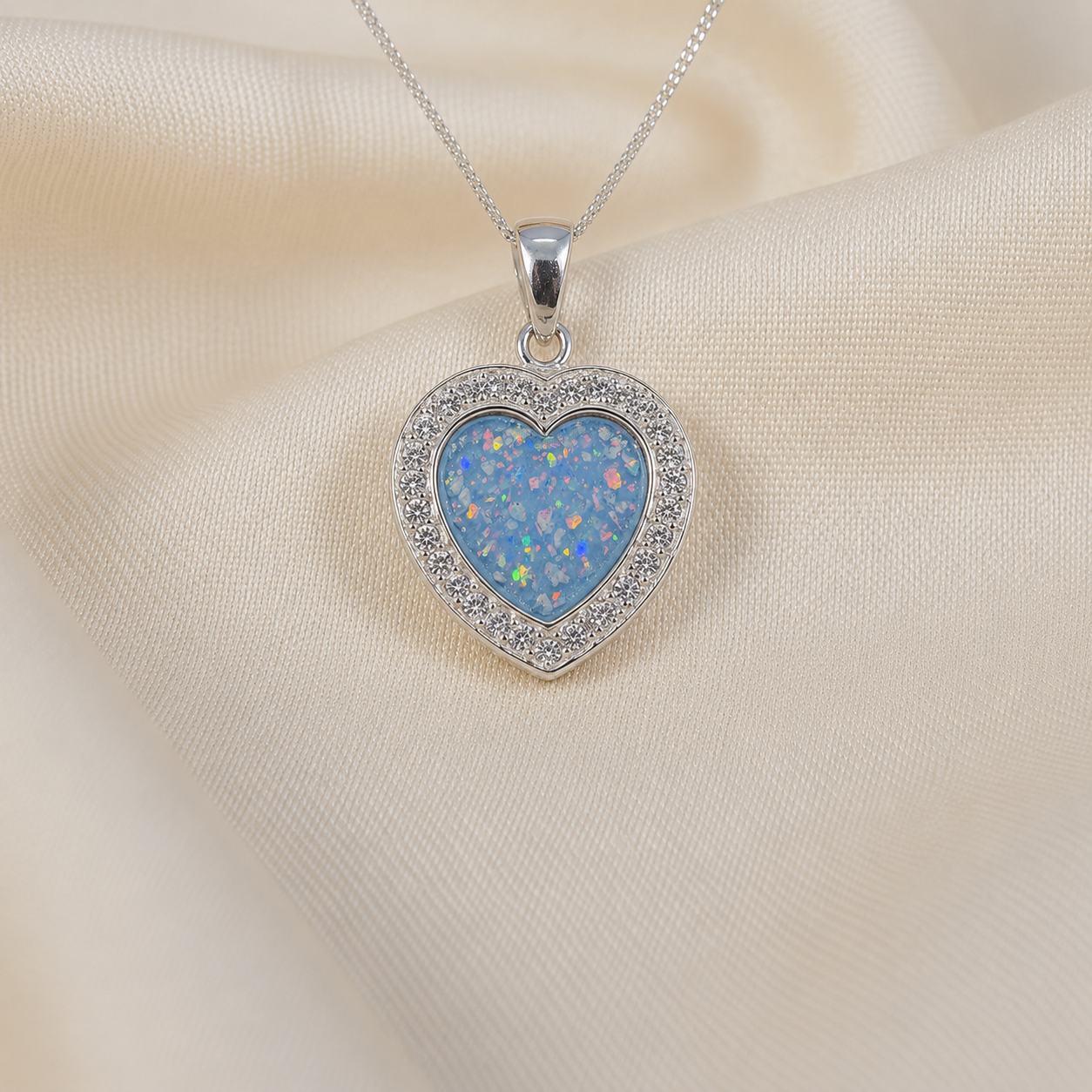 Antara Silver heart CZ shaped memorial pendant in baby blue, handcrafted in Lancashire UK