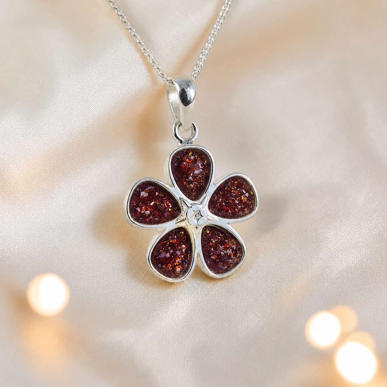 Arctura flower shaped ashes pendant in copper mocha, handcrafted in Lancashire UK