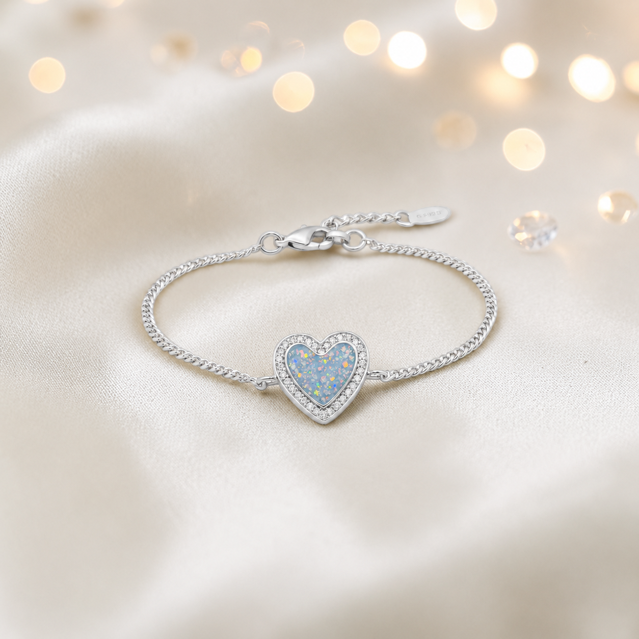 Astra silver heart CZ memorial ashes bracelet in baby blue, handcrafted in Lancashire UK - by Keepsake Memorial Jewellery
