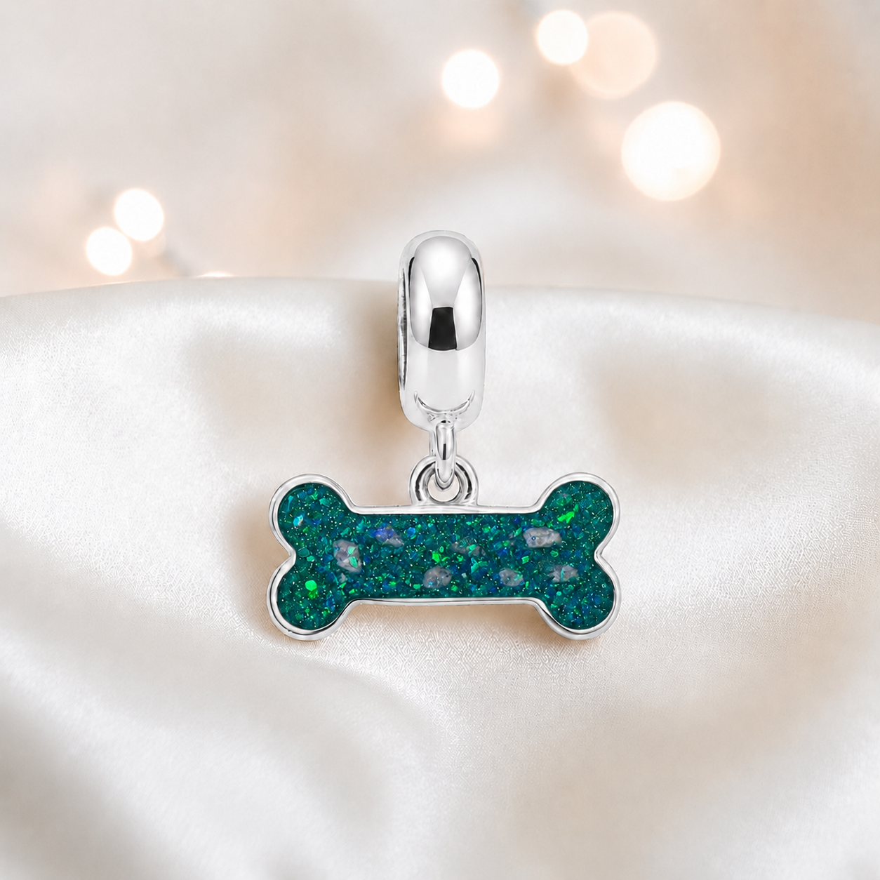 Milo silver dog bone ashes charm, in teal mist, handcrafted in Lancashire UK - by Keepsake Memorial Jewellery