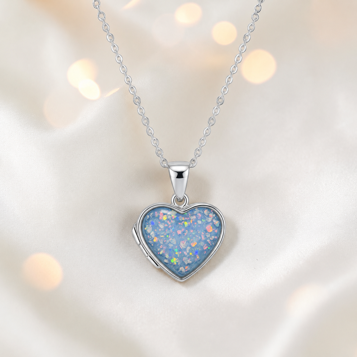 Regulus heart shaped memorial locket in baby blue, handcrafted in Lancashire UK - by Keepsake Memorial Jewellery