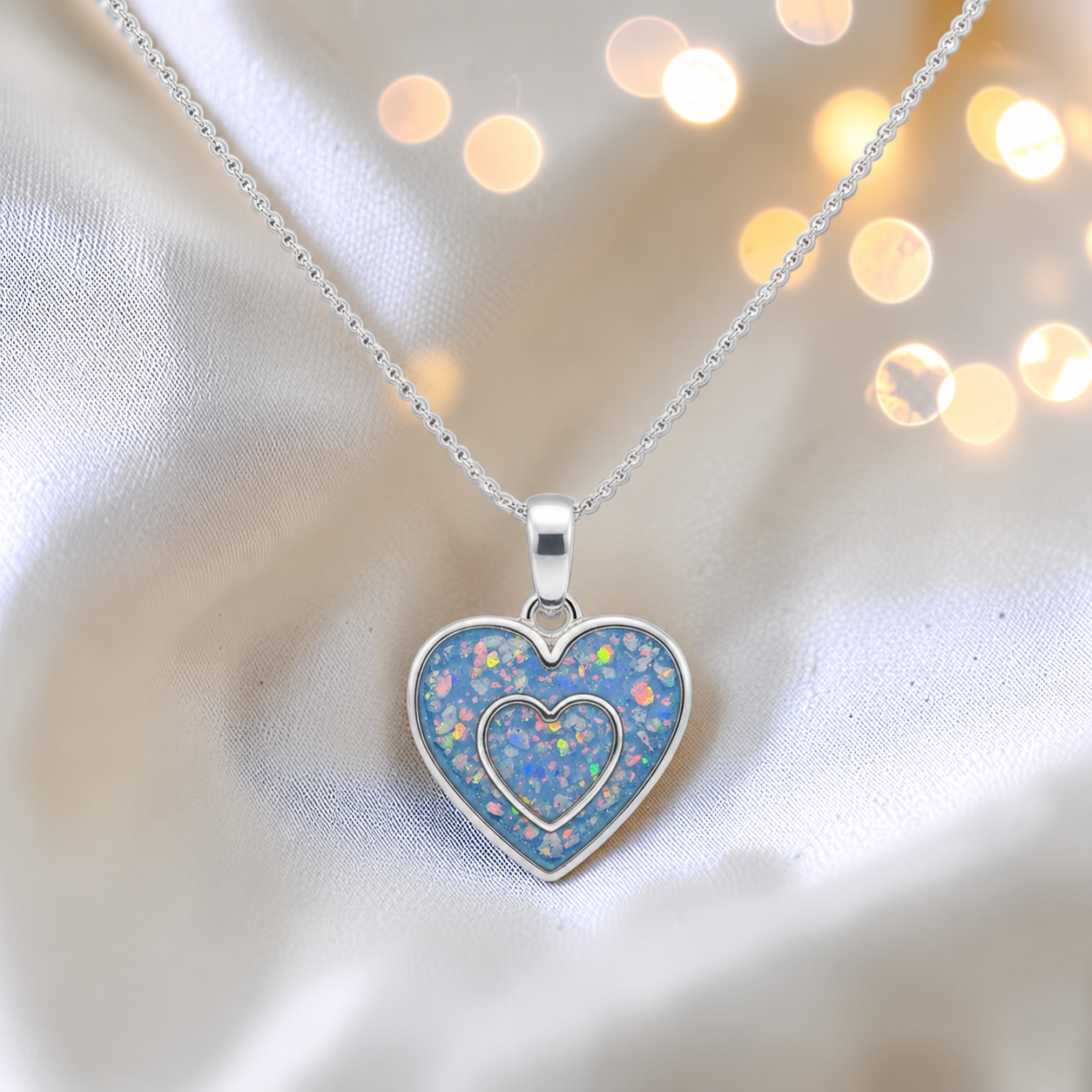 Shaula two heart memorial pendant in baby blue, handcrafted in Lancashire UK - by Keepsake Memorial Jewellery