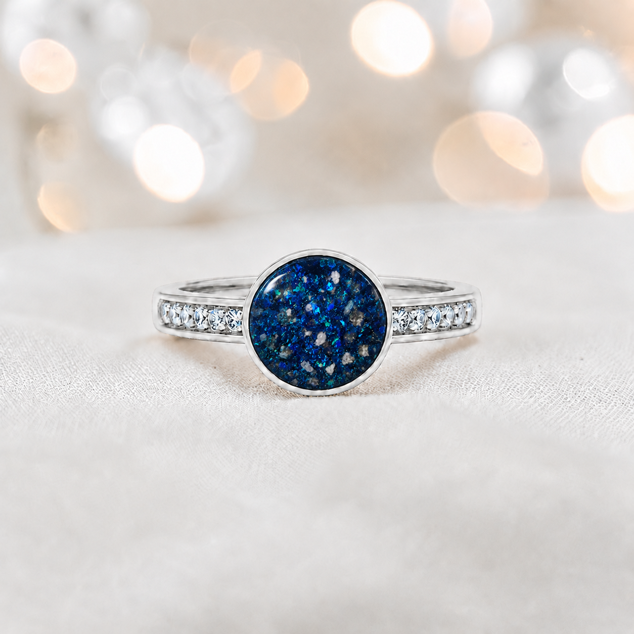 Keepsake Memorial Silver Whisper Ashes Ring in Sapphire Glow β handcrafted in Lancashire, UK
