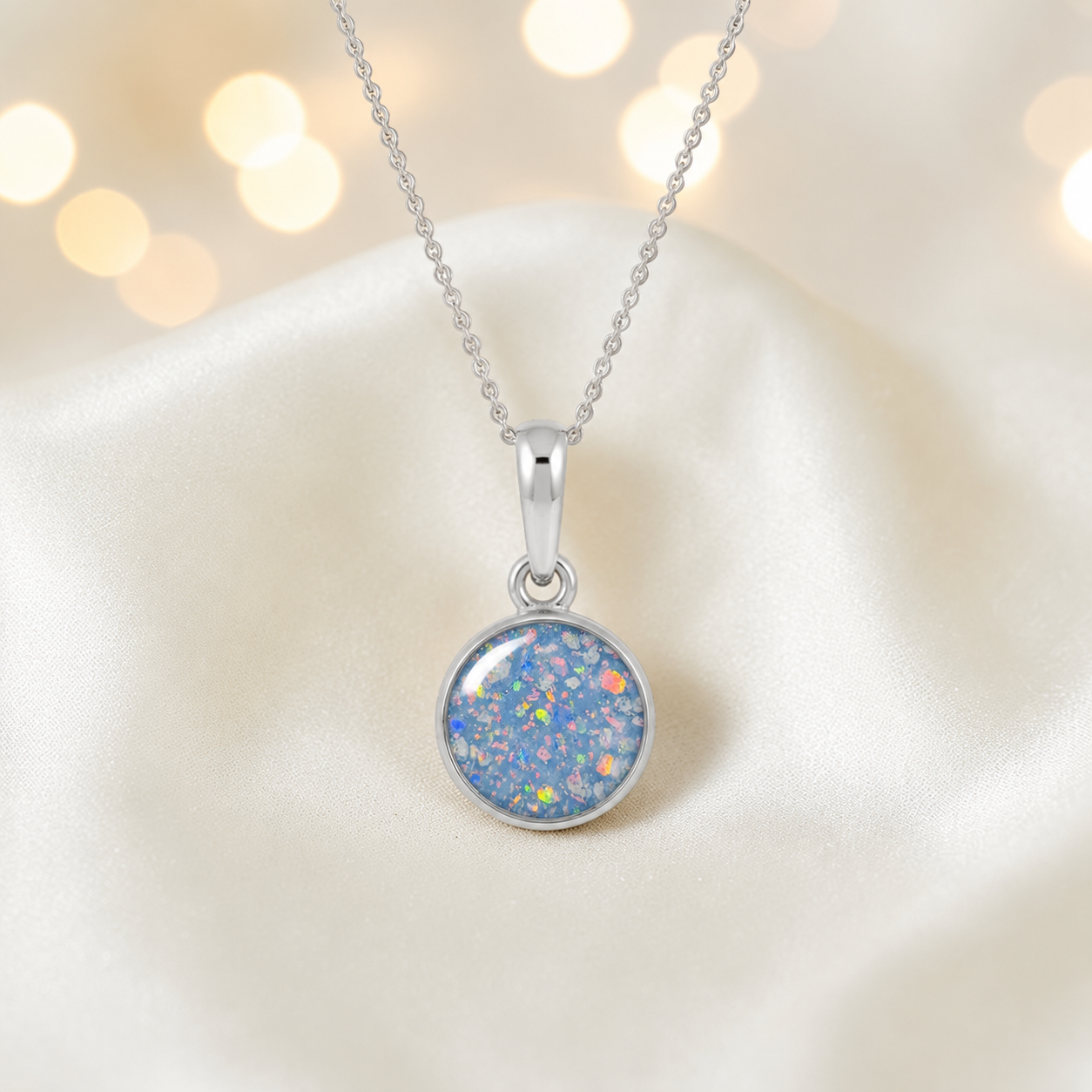Baby blue Eternal Gold 9ct gold pendant, handcrafted in Lancashire UK β by Keepsake Memorial Jewellery