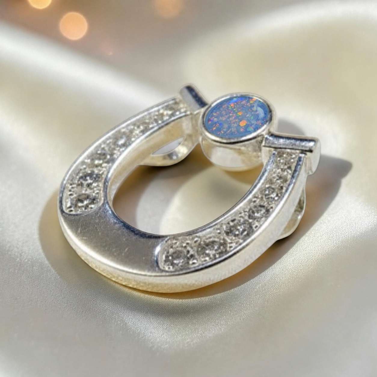 Sparkle horseshoe ashes pendant in baby blue, handcrafted in Lancashire UK - by Keepsake Memorial Jewellery