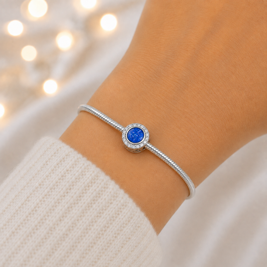 Royal Blue sterling silver halo ashes memorial charm, handcrafted in Lancashire by keepsake memorial