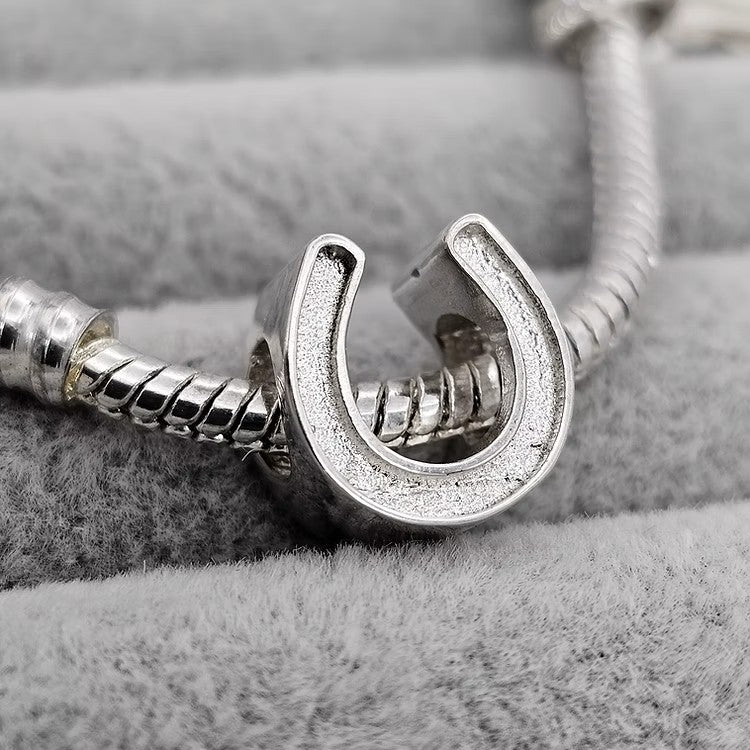 Silver Horseshoe ashes charm handcrafted in Lancashire, UK
