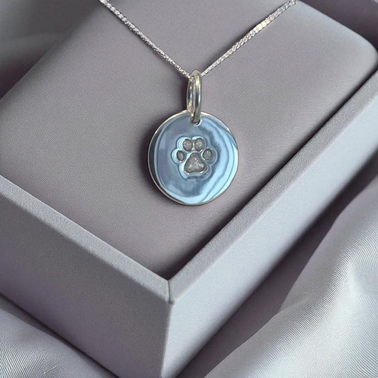 Silver dog paw memorial pendant handcrafted in Lancashire, UK