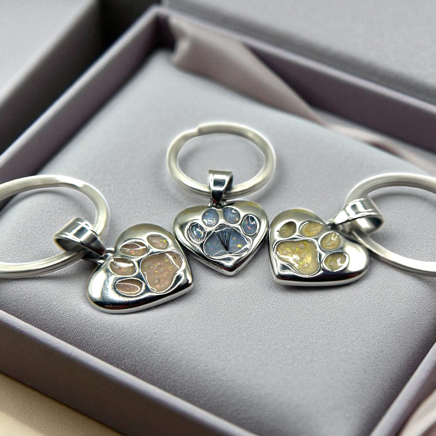 Stainless steel dog paw memorial keyring crafted in Lancashire, UK