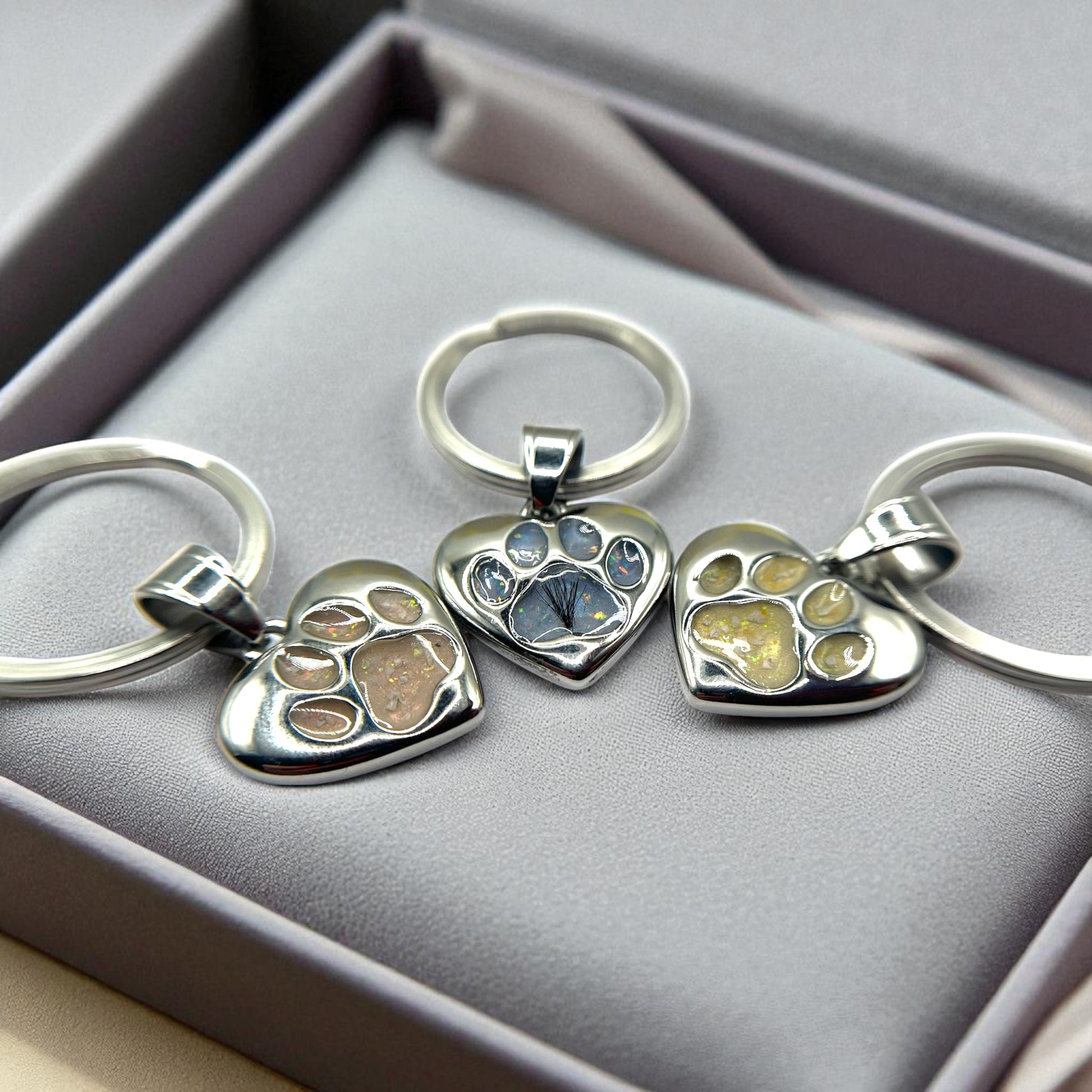 Stainless steel dog paw memorial keyring crafted in Lancashire, UK
