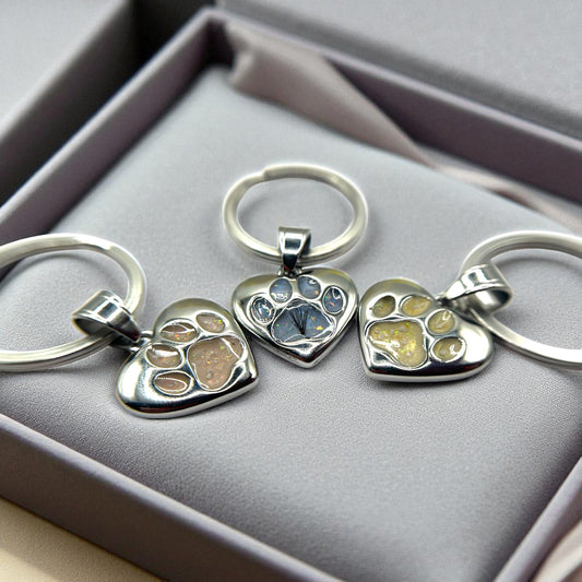 Stainless steel dog paw memorial keyring crafted in Lancashire, UK