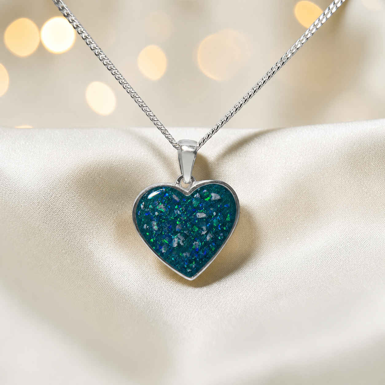 Silver Betel heart ashes memorial pendant in Teal Mist, handcrafted in Lancashire UK
