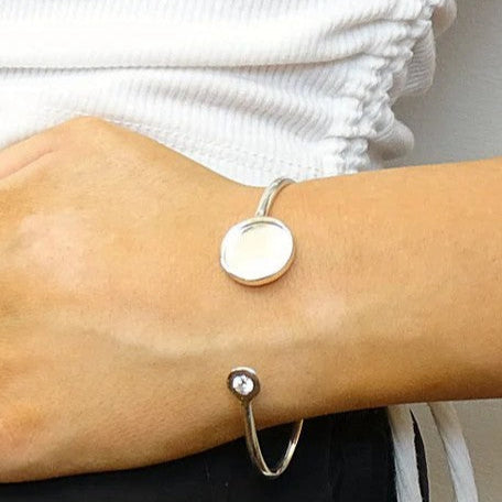 Solid Silver Bangle with Round setting area and CZ Stone