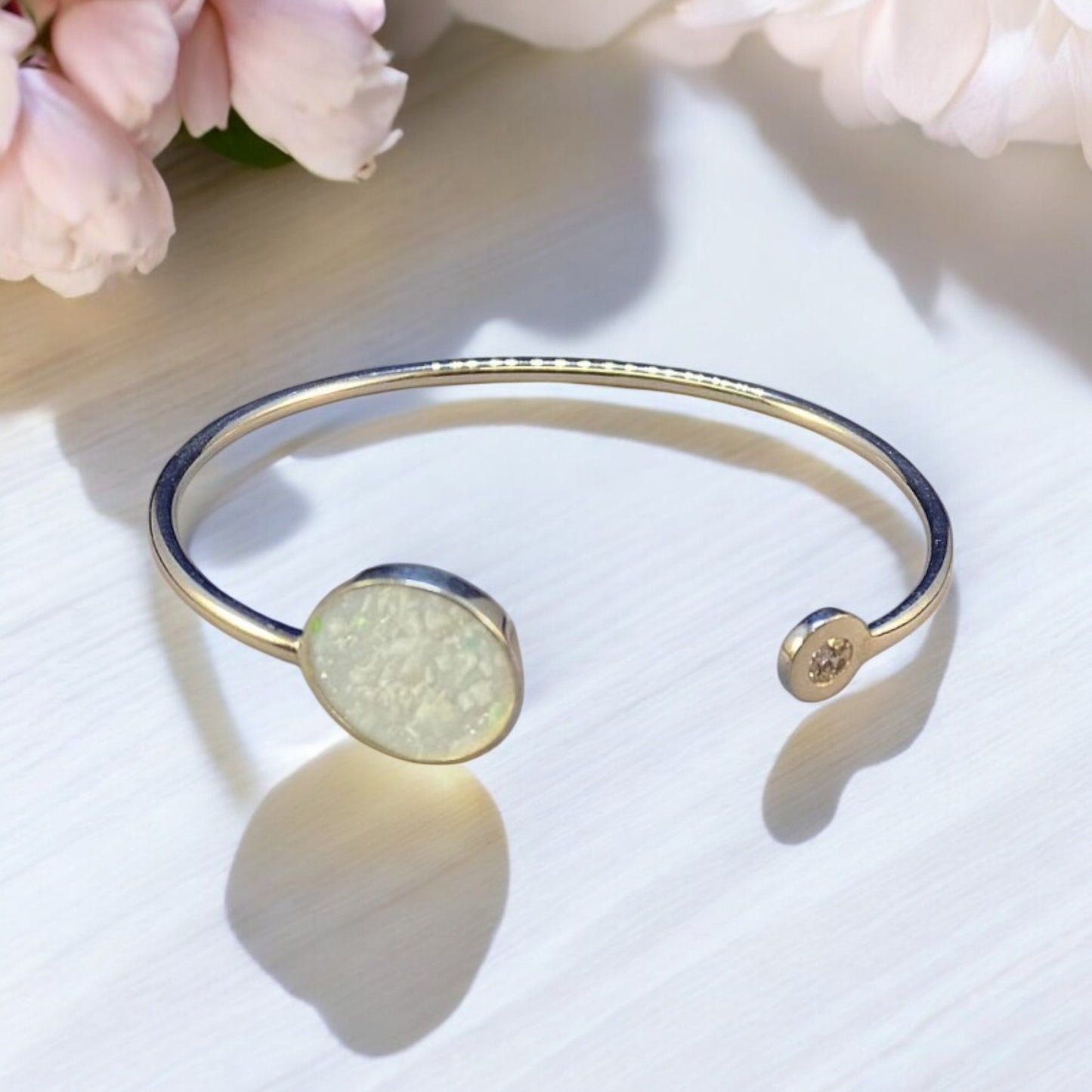 Solid Silver Bangle with Round setting area and CZ Stone