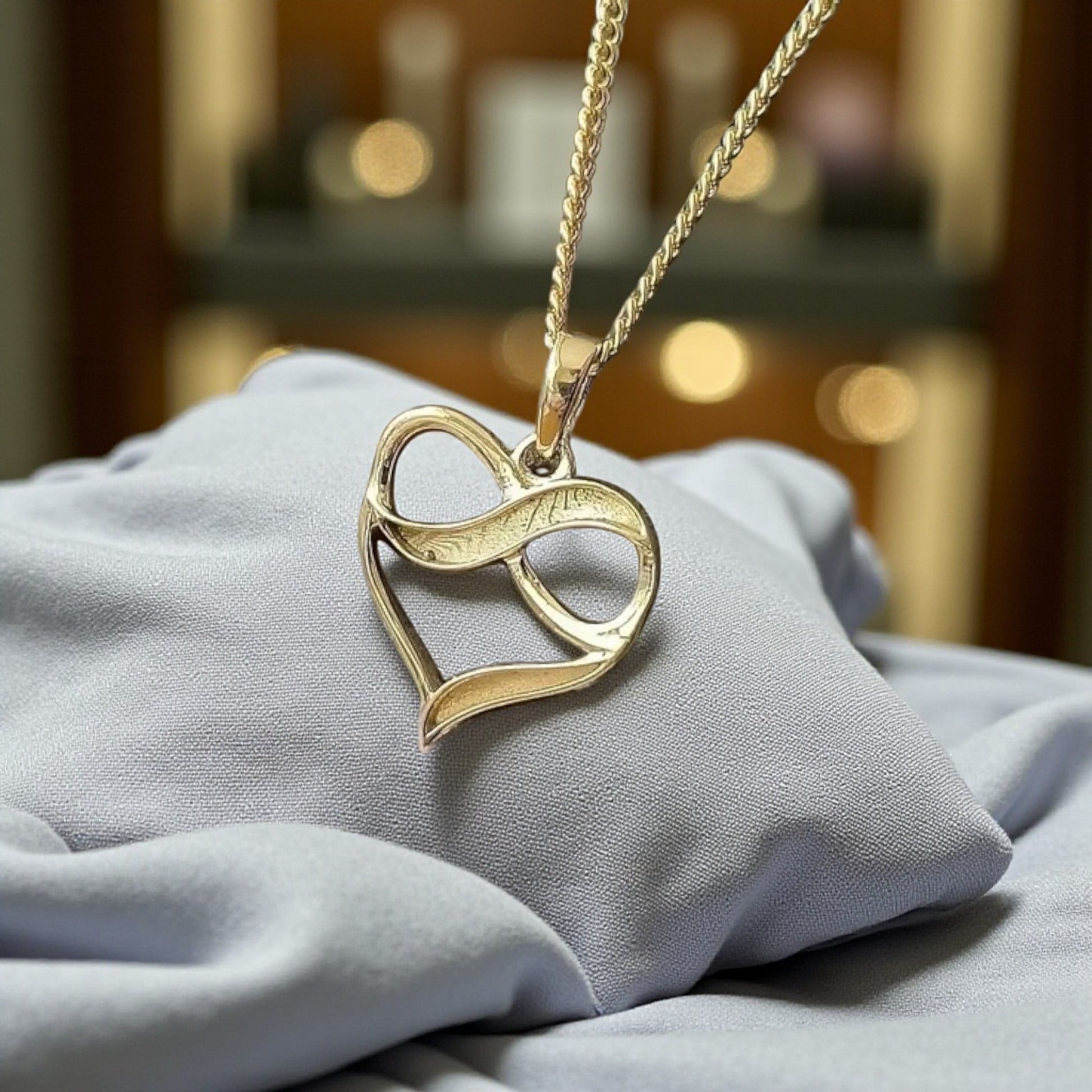 9ct gold infinity open heart pendant, handcrafted in Lancashire, UK