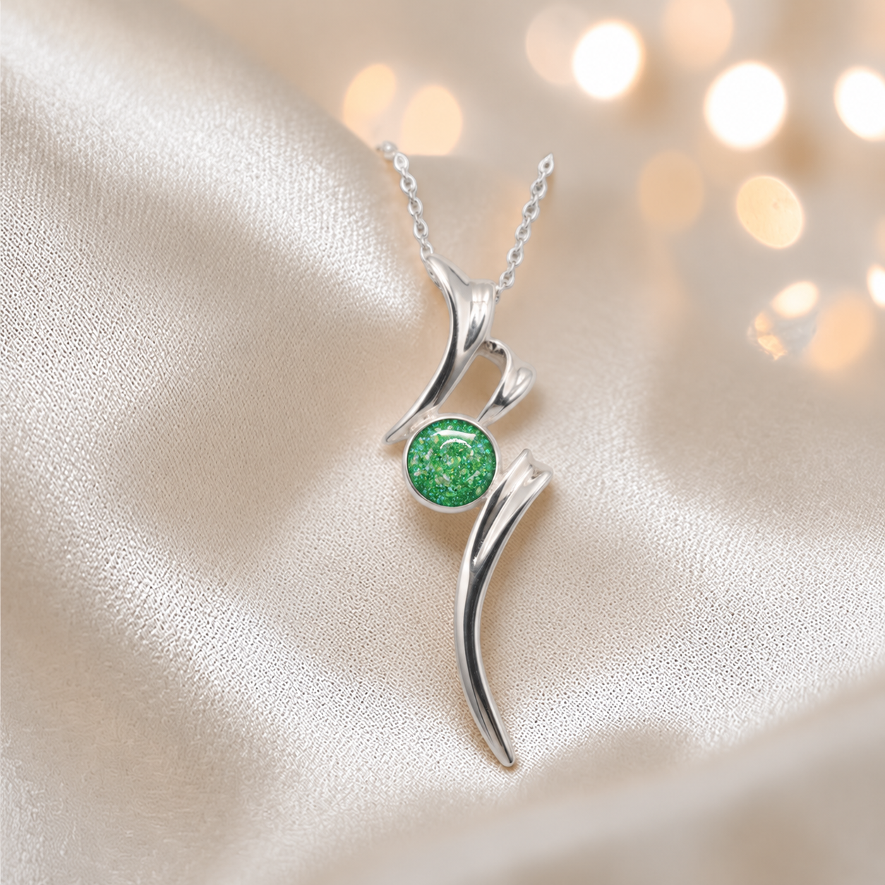 Abstract silver memorial ashes pendant in fruit green, handcrafted in Lancashire UK