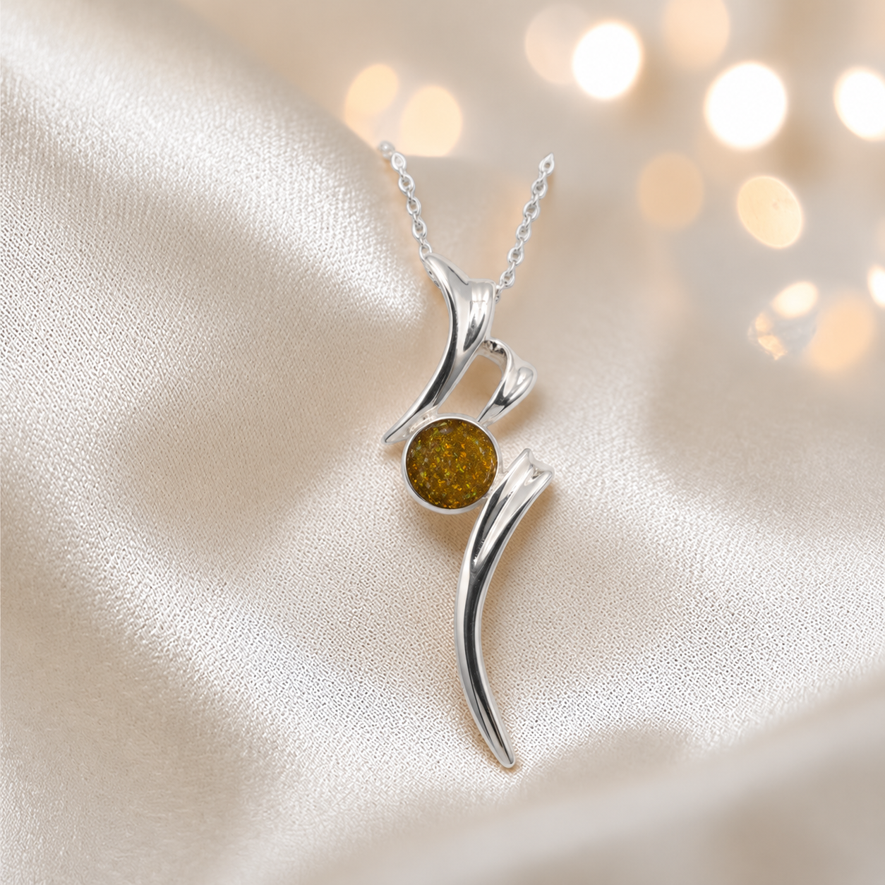 Abstract silver memorial ashes pendant in gold olive, handcrafted in Lancashire UK