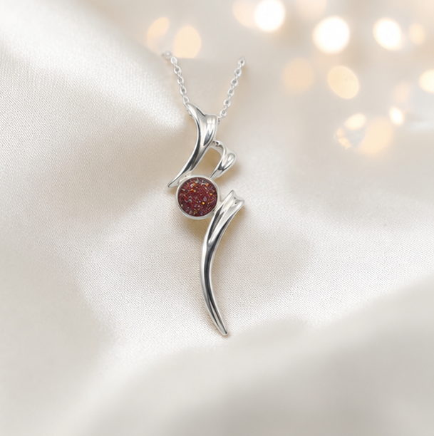 Abstract silver memorial ashes pendant in ruby red, handcrafted in Lancashire UK