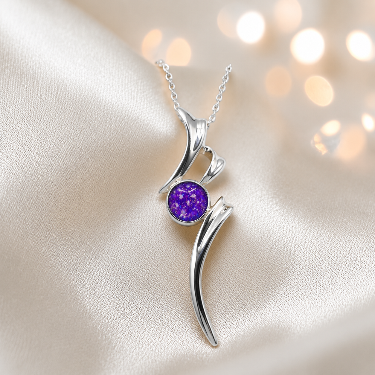 Abstract silver memorial ashes pendant in sleepy lavender, handcrafted in Lancashire UK