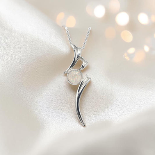 Abstract silver memorial ashes pendant in white snow, handcrafted in Lancashire UK