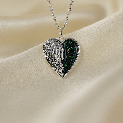 Achern angel heart ashes pendant in black flame, handcrafted in Lancashire UK - by Keepsake Memorial Jewellery
