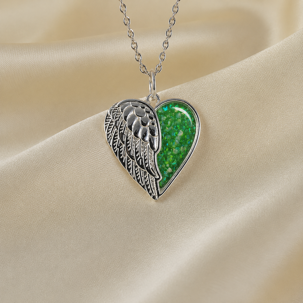 Achern angel heart ashes pendant in fruit green, handcrafted in Lancashire UK - by Keepsake Memorial Jewellery