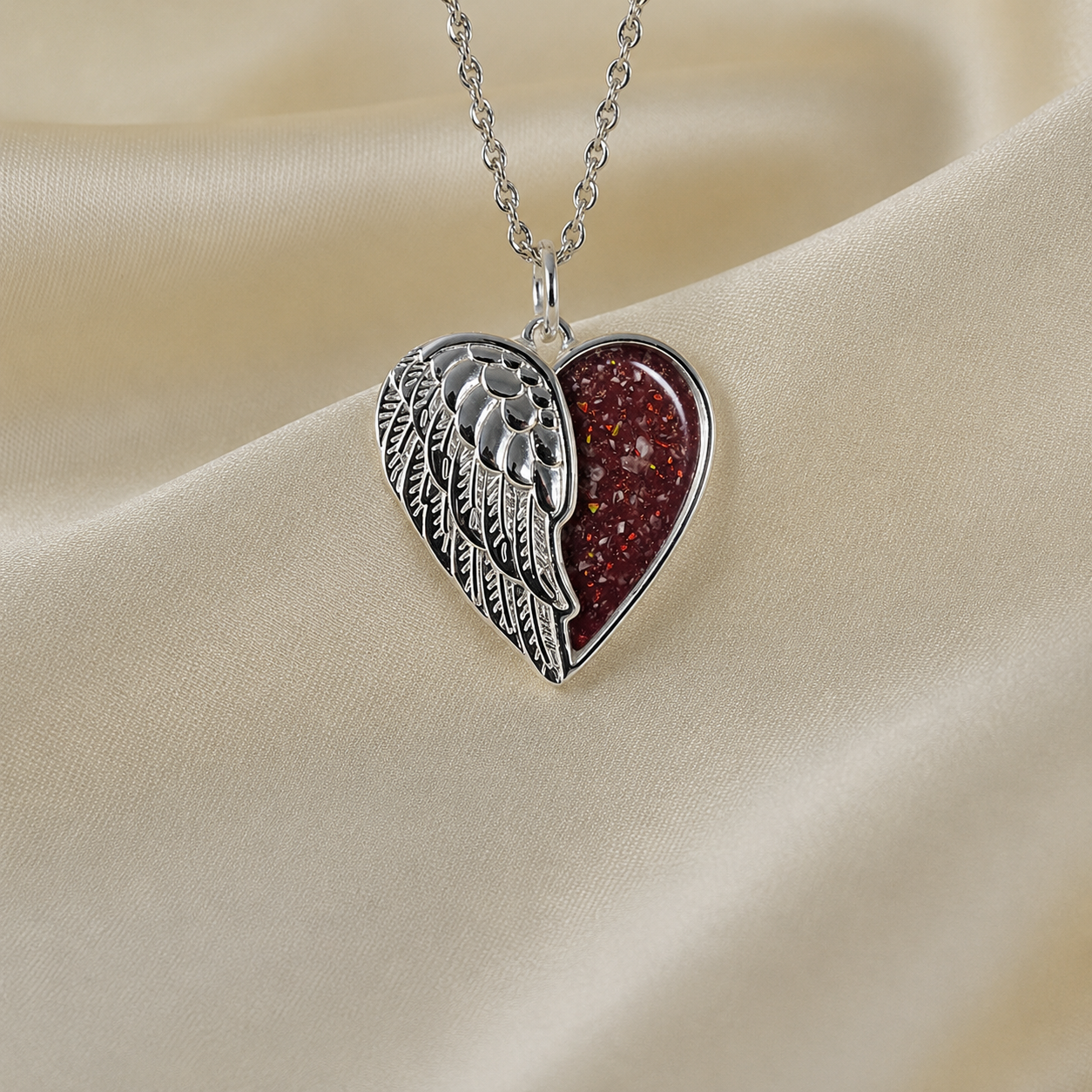 Achern angel heart ashes pendant ruby red, handcrafted in Lancashire UK - by Keepsake Memorial Jewellery