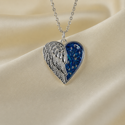 Achern angel heart ashes pendant in sapphire glow, handcrafted in Lancashire UK - by Keepsake Memorial Jewellery