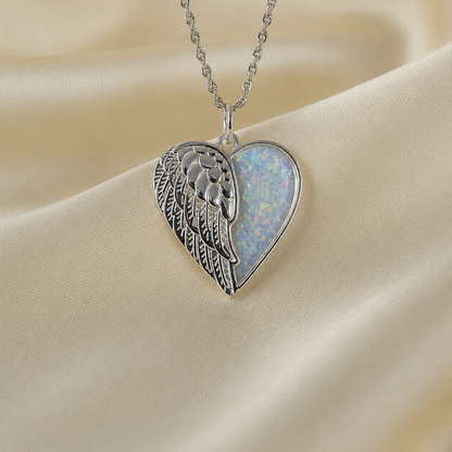 Achern angel heart ashes pendant in white snow, handcrafted in Lancashire UK - by Keepsake Memorial Jewellery