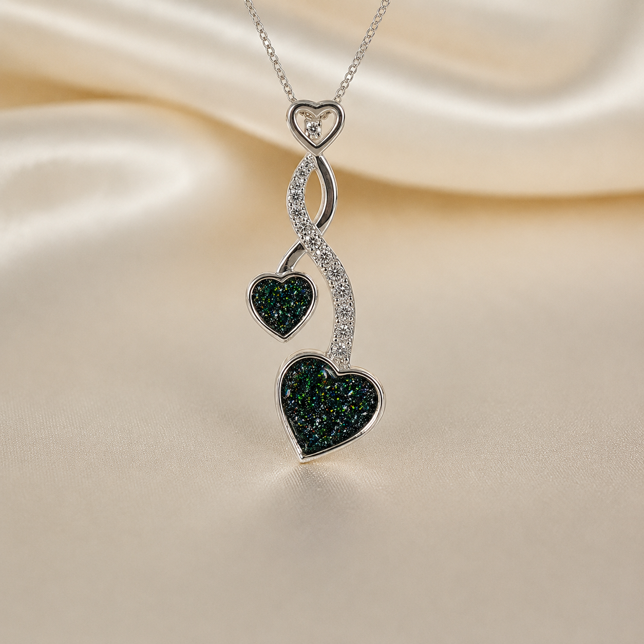 Aldera silver twin heart ashes memorial pendant in black flame, handcrafted in Lancashire UK