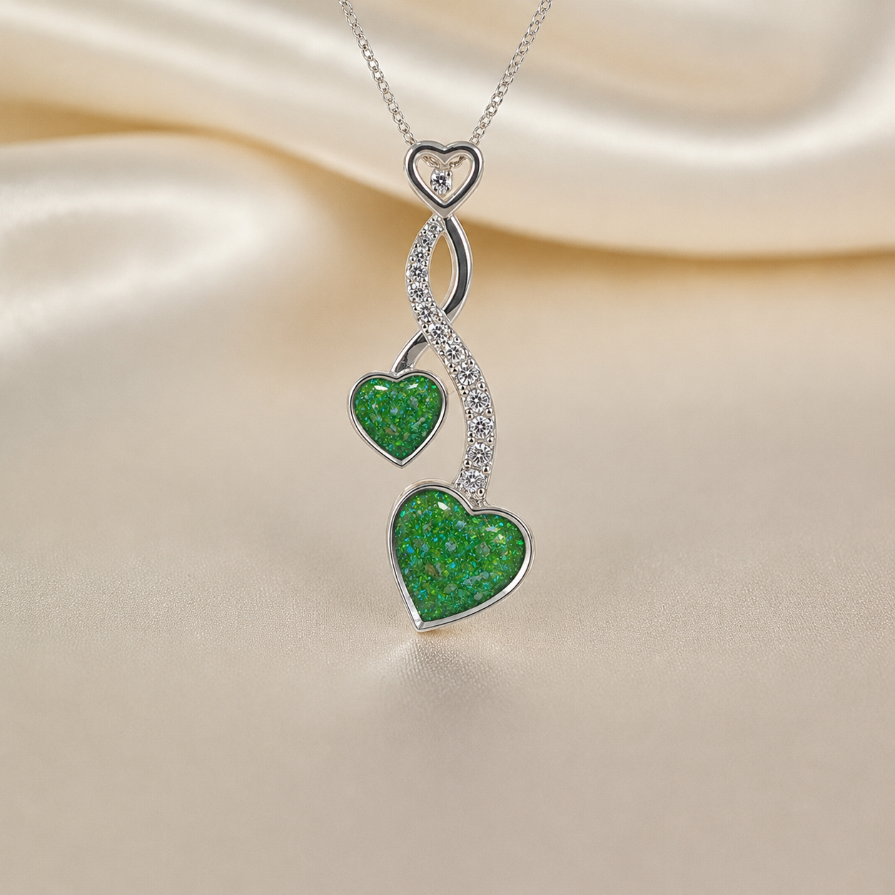 Aldera silver twin heart ashes memorial pendant in fruit green, handcrafted in Lancashire UK