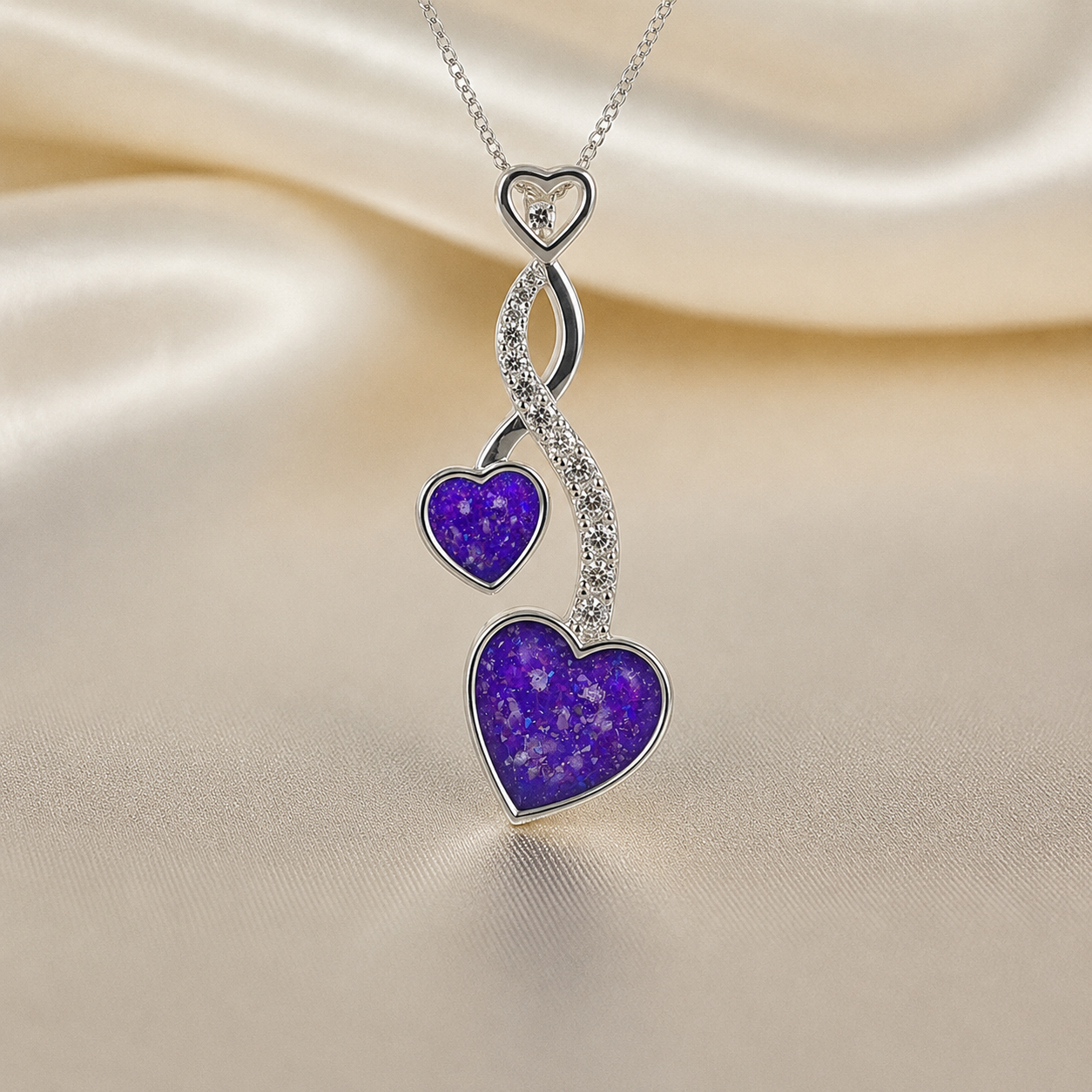 Aldera silver twin heart ashes memorial pendant in sleepy lavender, handcrafted in Lancashire UK