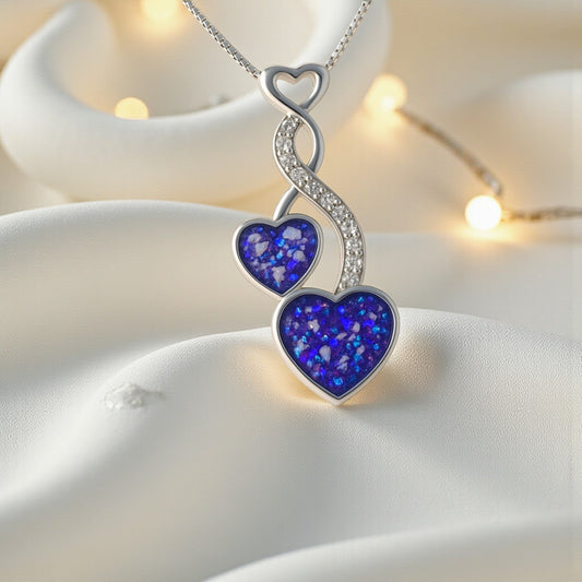 Aldera silver twin heart ashes memorial pendant, handcrafted in Lancashire UK