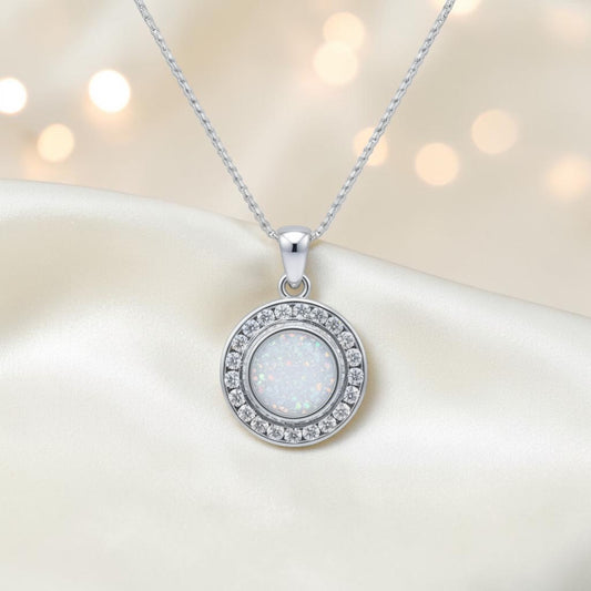 Alderan round halo CZ memorial pendant in White Snow, 925 sterling silver, handcrafted in the UK