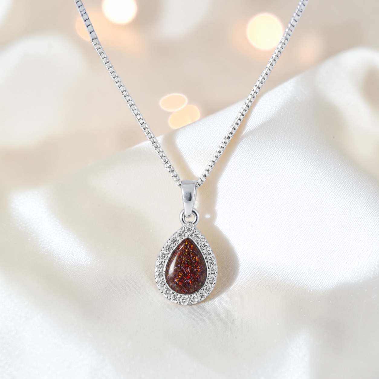 Almara teardrop dainty CZ ashes pendant in copper mocha, handcrafted in Lancashire UK - by Keepsake Memorial Jewellery
