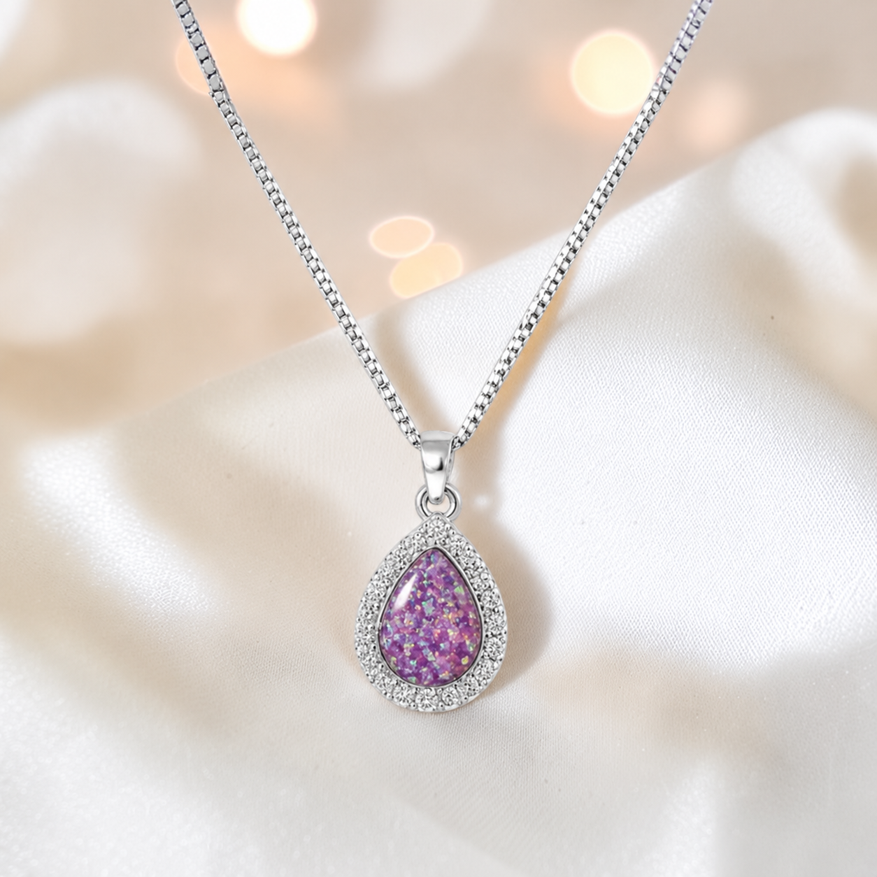 Almara teardrop dainty CZ ashes pendant in rose pink, handcrafted in Lancashire UK - by Keepsake Memorial Jewellery
