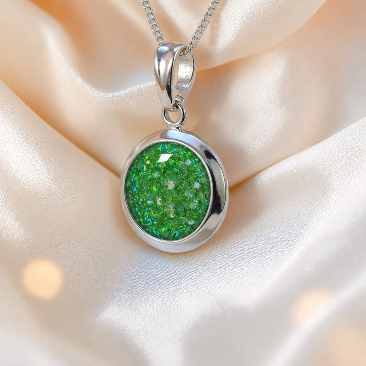 Altair round ashes pendant in fruit green, handcrafted in Lancashire UK