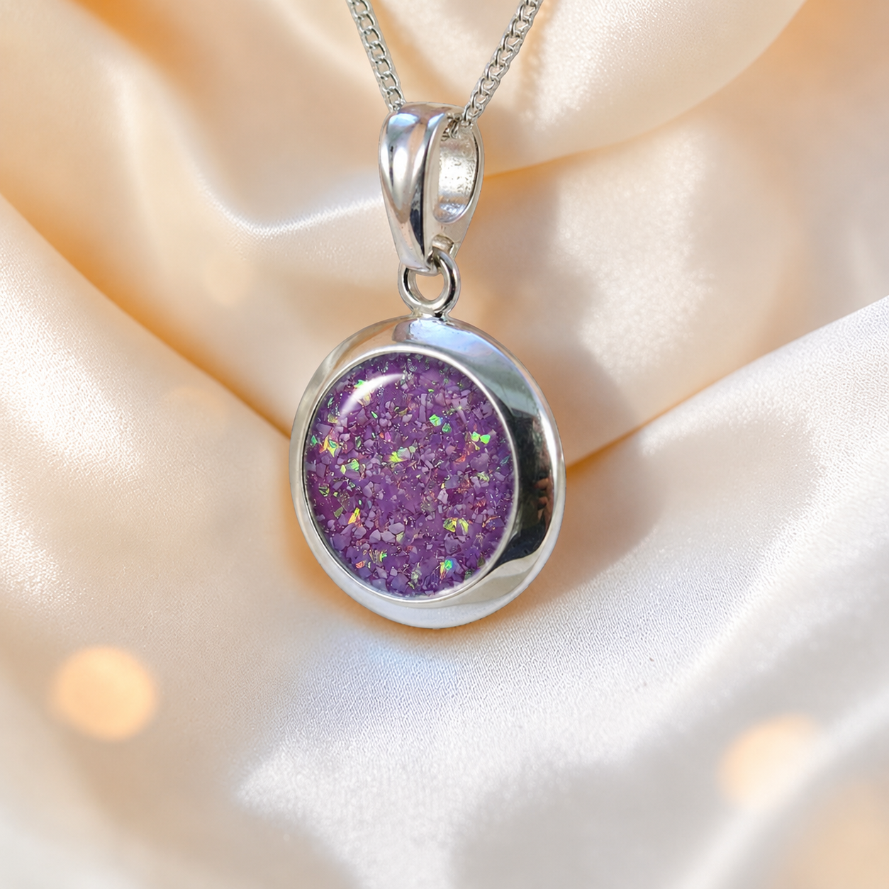 Altair round ashes pendant in rose pink, handcrafted in Lancashire UK