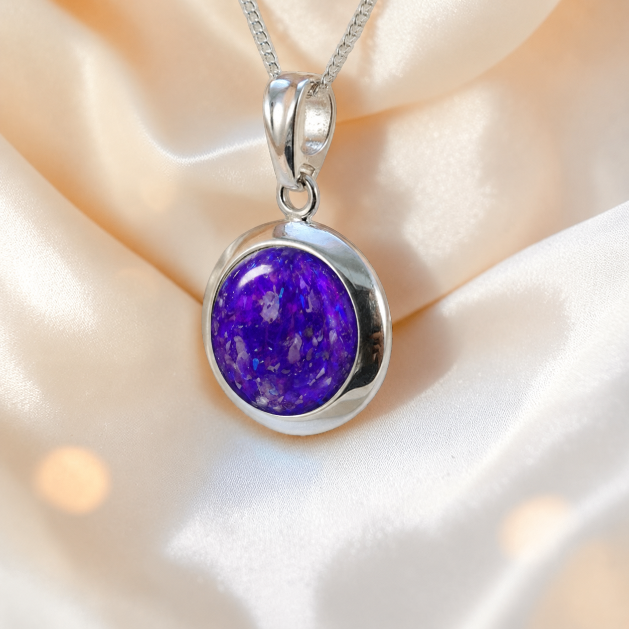 Altair round ashes pendant in sleepy lavender, handcrafted in Lancashire UK