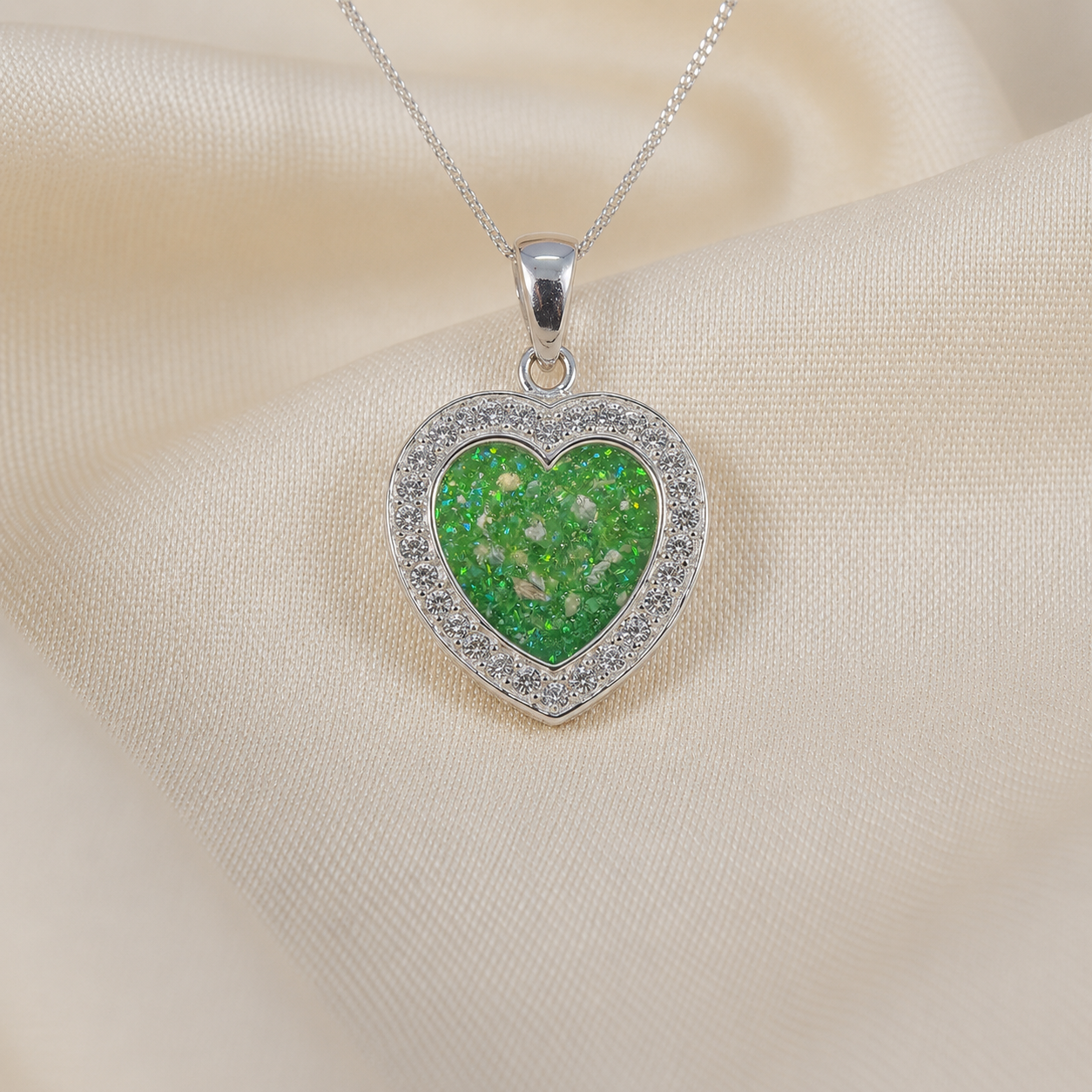 Antara Silver heart CZ shaped memorial pendant in fruit green, handcrafted in Lancashire UK