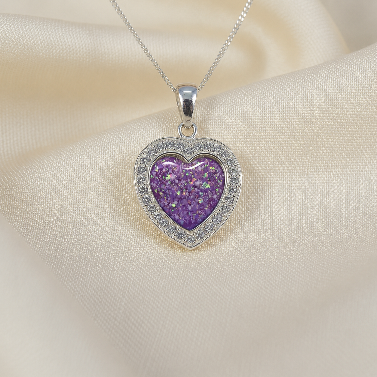 Antara Silver heart CZ shaped memorial pendant in rose pink, handcrafted in Lancashire UK