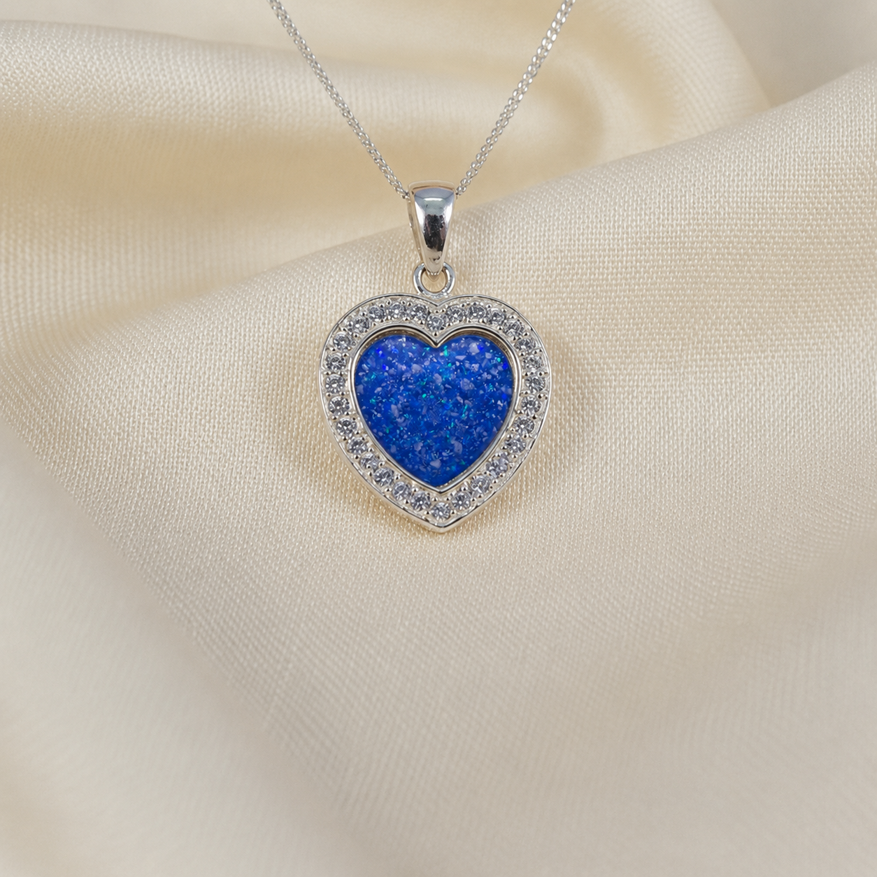 Antara Silver heart CZ shaped memorial pendant in royal blue, handcrafted in Lancashire UK