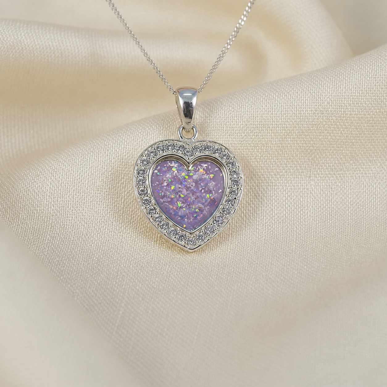 Antara Silver heart CZ shaped memorial pendant in unicorn purple, handcrafted in Lancashire UK