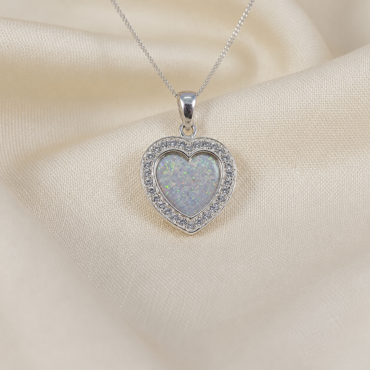 Antara Silver heart CZ shaped memorial pendant in white snow, handcrafted in Lancashire UK