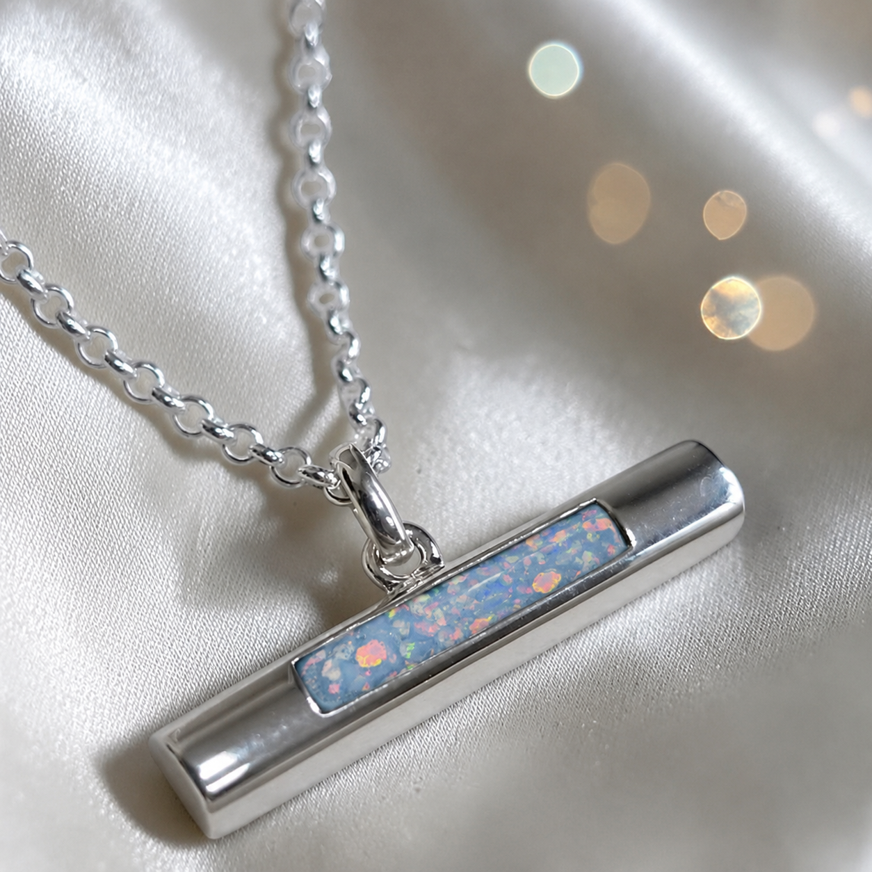 Arielle sterling silver T Bar ashes pendant in baby blue, handcrafted in Lancashire, UK