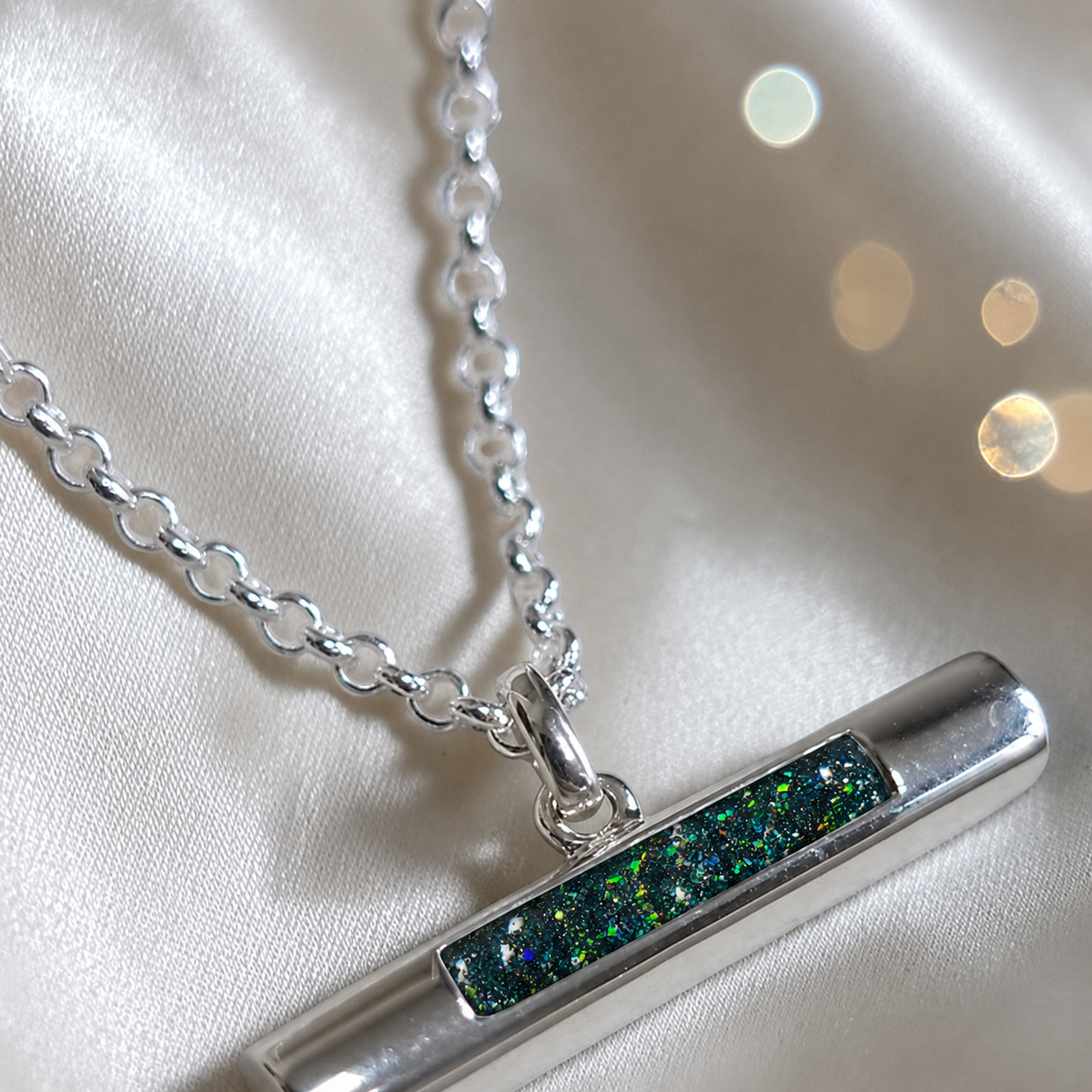 Arielle sterling silver T Bar ashes pendant in black flame, handcrafted in Lancashire, UK