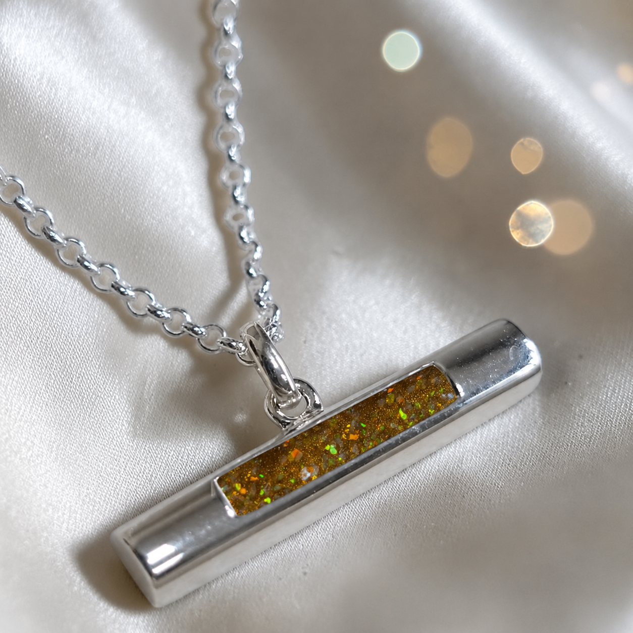 Arielle sterling silver T Bar ashes pendant in gold olive, handcrafted in Lancashire, UK
