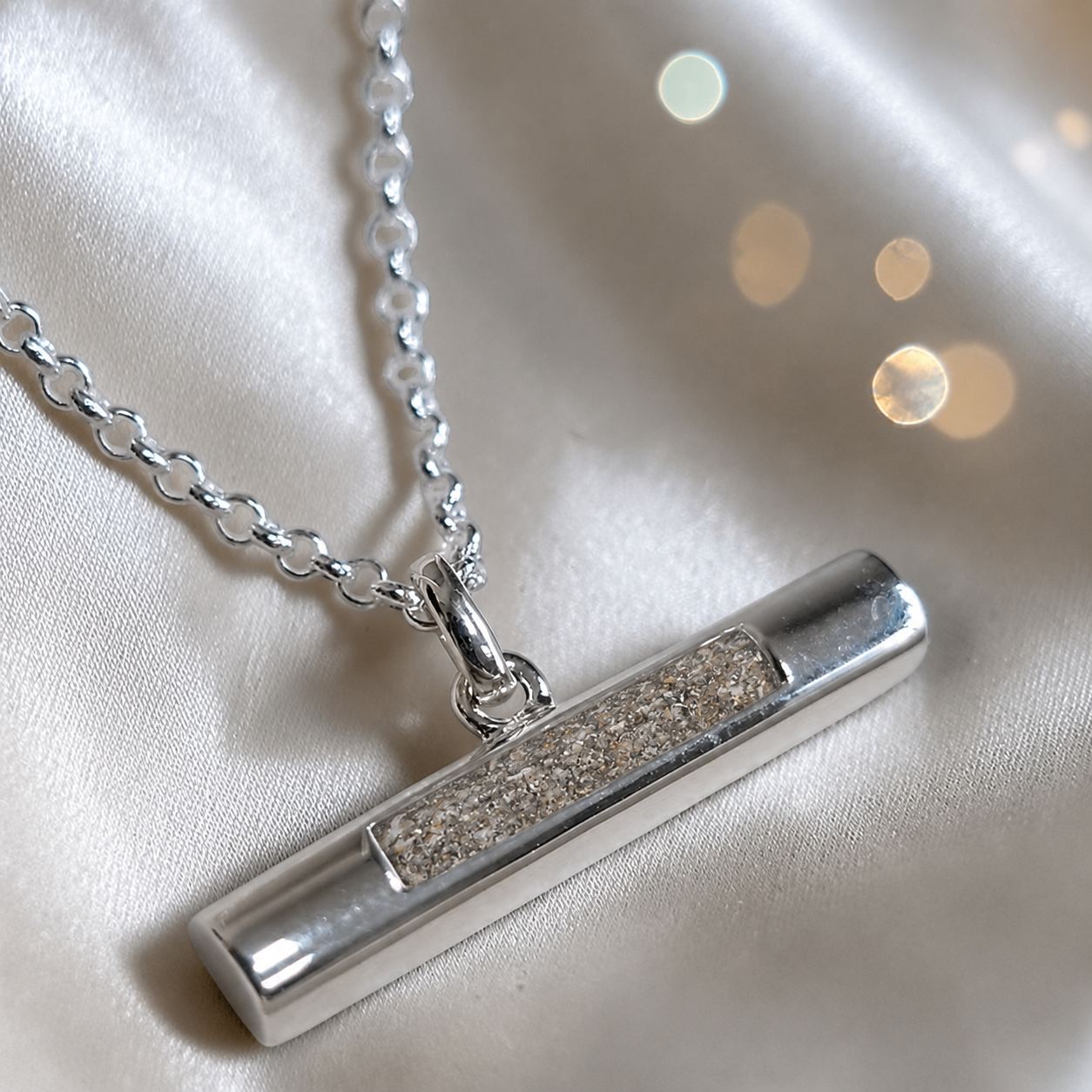 Arielle sterling silver T Bar ashes pendant in natural ash, handcrafted in Lancashire, UK