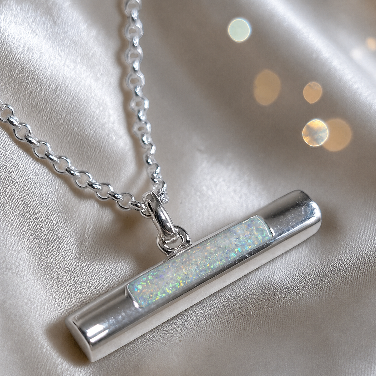 Arielle sterling silver T Bar ashes pendant in white snow, handcrafted in Lancashire, UK